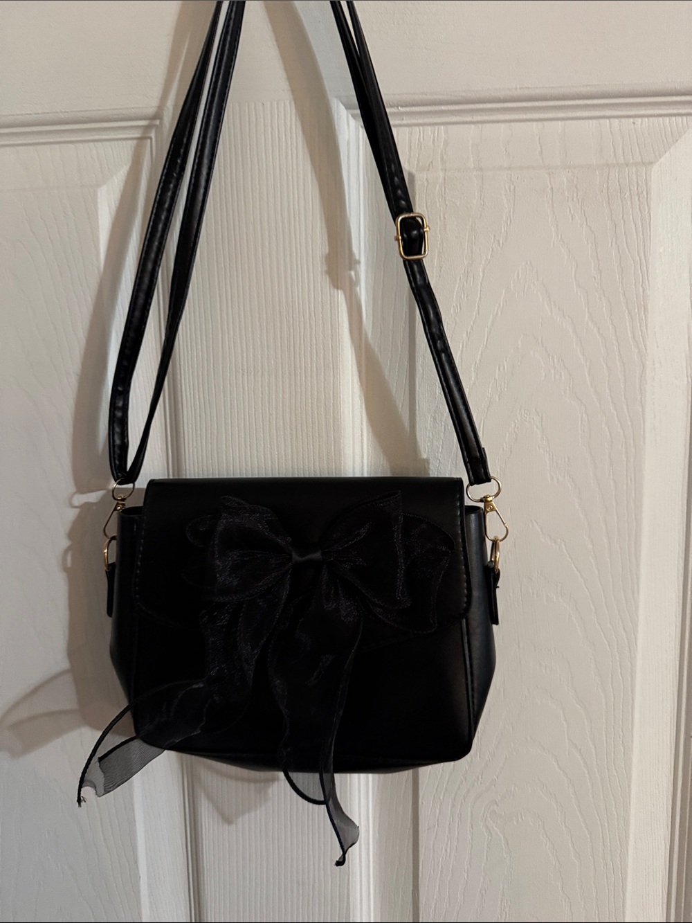 Black Crossbody Bag/over the shoulder, black soft, FUX leather with black bow.